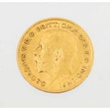 An George V gold half sovereign, dated 1912, 4.1 grams