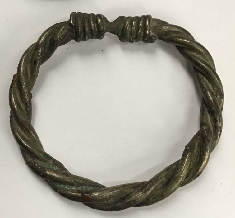 Three Roman Period jewellery items of two bracelets and one hair pin (6cm), one of the bracelets - Image 2 of 5