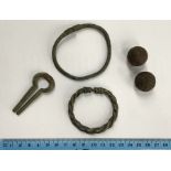 Three Roman Period jewellery items of two bracelets and one hair pin (6cm), one of the bracelets