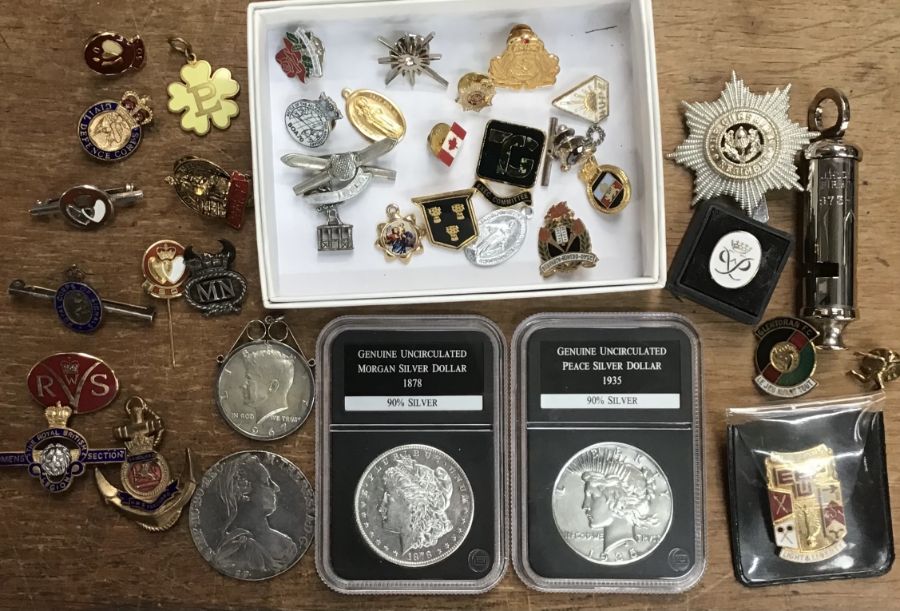 Collection of Coins and Pin badges, includes two sealed American Dollars one 1878 Morgan and 1935
