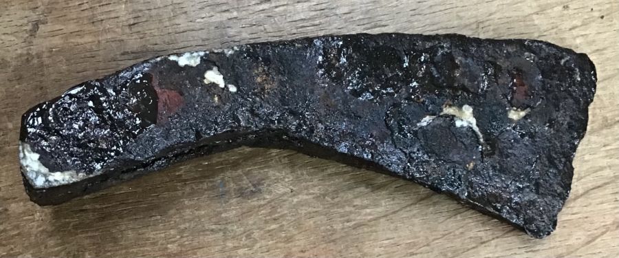 Roman axe head. Approximately 19cm long.