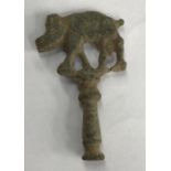 Late 17th early 18th Century pipe tamper in the form of a wild boar. Approximately 5cm.