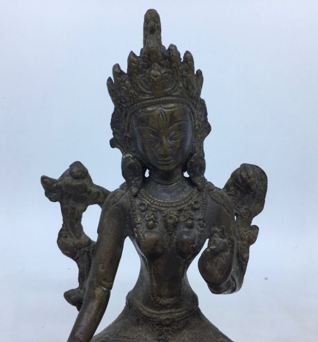 A 20th century Sino-Tibetan bronze figure of a deity, probably of White Tara, height 21.5cm. - Image 2 of 5