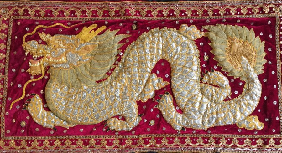 A Chinese Republican period embroidered wall hanging of a dragon, 78cm X 149cm. - Image 2 of 4