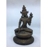 A 20th century Indian bronze figure of a seated Bodhisattva, with flowering lotus, height 31.7cm