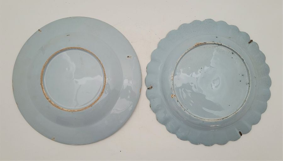 Two mid 18th century English Delftware plates, both with blue ground and with rim painted bianco- - Image 2 of 6