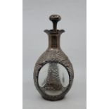 A Chinese export silver mounted decanter, the sleeve pierced and embossed pagodas and sailing