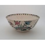 An 18th century English Delftware bowl, painted in colours, Gautier collection label to base, height