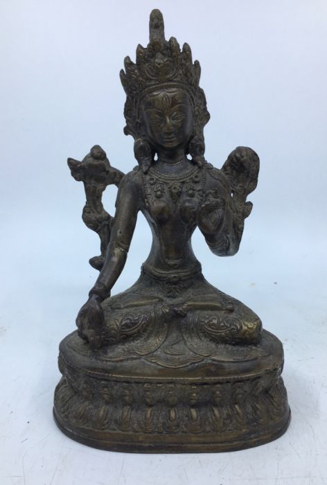 A 20th century Sino-Tibetan bronze figure of a deity, probably of White Tara, height 21.5cm.