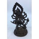 A 20th century Indian bronze figure of eight armed Durga, height 13.5cm.