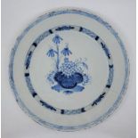 An 18th century English Delftware charger, painted in blue, diameter 34.5cm, height 3.8cm. Condition