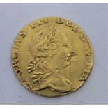 A George III 1762 1/4 Guinea gold coin