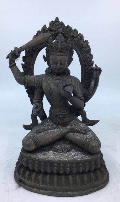 A 20th century Sino-Tibetan bronze figure of Manjushri, height 21.3cm.