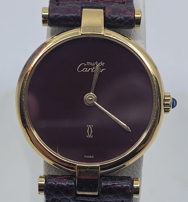 A Must de Cartier gold plated ladies' wristwatch, quartz movement, having signed black circular