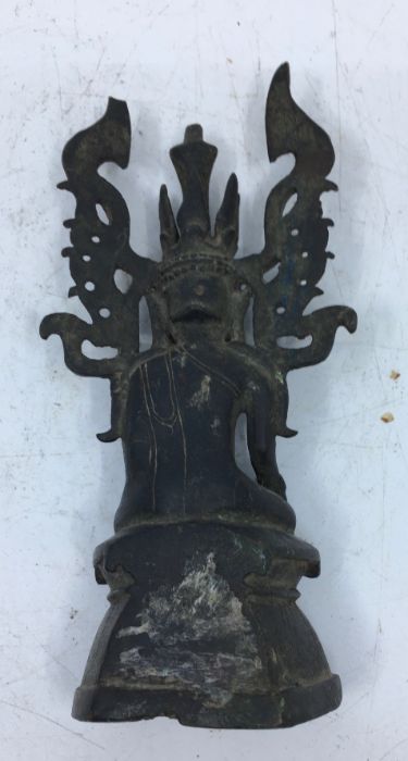 A 18th/19th century Sino-Tibetan bronze figure of a Bodhisattva, possibly being Ratnasambhava, - Image 5 of 6