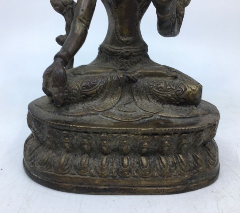 A 20th century Sino-Tibetan bronze figure of a deity, probably of White Tara, height 21.5cm. - Image 3 of 5