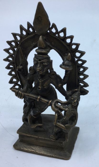 A late 19th/early 20th century Indian bronze figure of four armed Durga, height 11.8cm. - Image 4 of 6