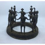 A 20th century bronze figural group, diameter: 23.3cm.