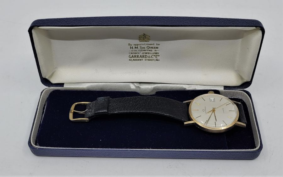 A Garrard 9ct. gold gentleman's quartz wrist watch, c.1984, having signed circular silvered dial - Image 6 of 6