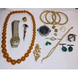 A collection of costume jewellery to include jade drops , amber necklace : yellow metal and silver