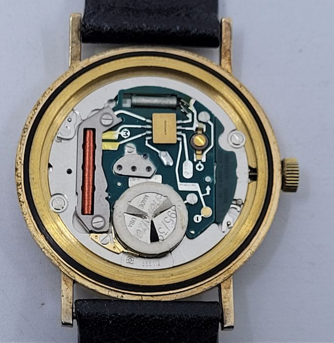 A Garrard 9ct. gold gentleman's quartz wrist watch, c.1984, having signed circular silvered dial - Image 2 of 6