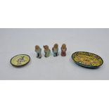 A small 19th century Chinese enamel dish, together with four Chinese porcelain figures of sages,