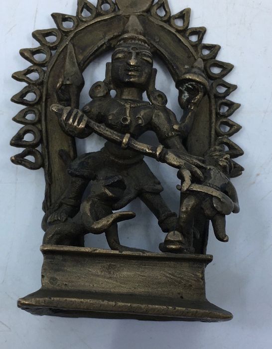 A late 19th/early 20th century Indian bronze figure of four armed Durga, height 11.8cm. - Image 3 of 6
