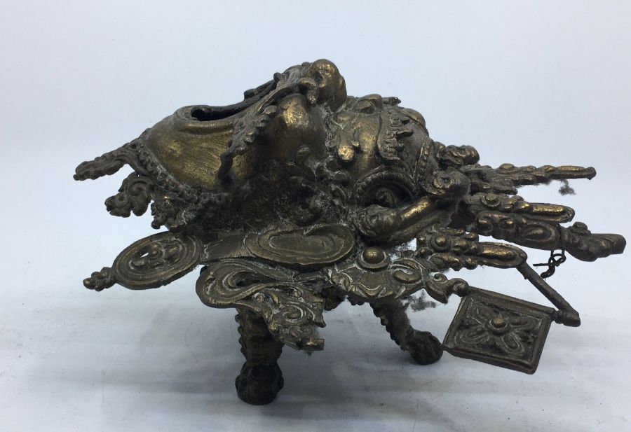 A 20th century Sino-Tibetan bronze censer, fashioned as the mask of a fierce protective deity, - Image 4 of 5