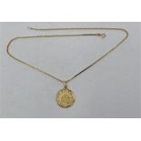 An 18ct. gold pierced octagonal form pendant, (2.8g), suspended from a 9ct. gold box link chain,