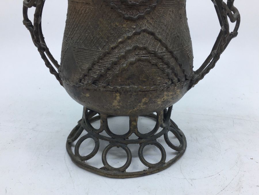 A 20th century Indian bronze twin handled jar, raised upon pierced pedestal foot, the associated - Image 3 of 4