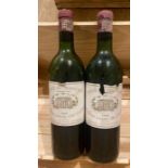 Two bottles of Chateau Margaux  1966 levels low