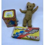 A vintage tinplate Tom & Jerry toy: Chiltern bear and another