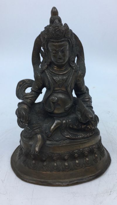 A 20th century Sino-Tibetan bronze figure of Jambhala, height 16cm.