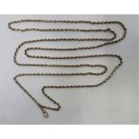 A 9ct. gold belcher link guard chain, length approx. 152cm. (14.6g)