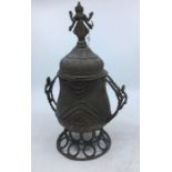 A 20th century Indian bronze twin handled jar, raised upon pierced pedestal foot, the associated