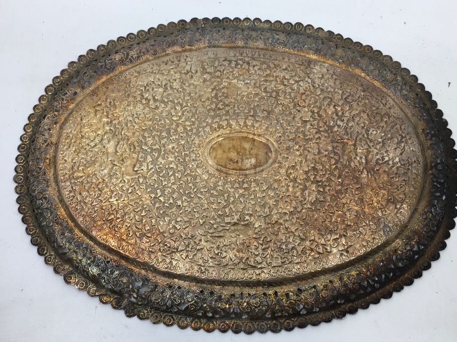 An early 20th century Indian white metal presentation oval plate, repousse scrolling foliage and - Image 5 of 5