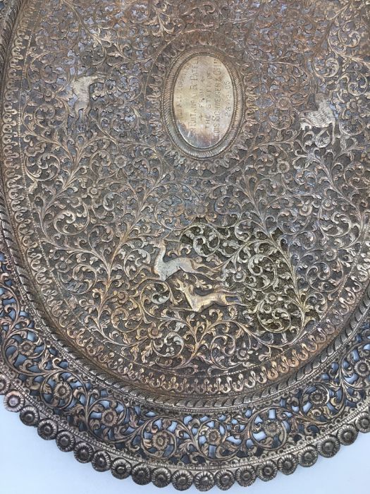 An early 20th century Indian white metal presentation oval plate, repousse scrolling foliage and - Image 4 of 5