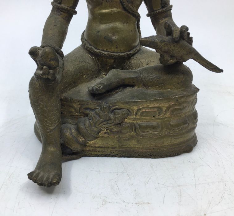 A 20th century bronze figure of Jambhala, height 19.5cm. - Image 3 of 5