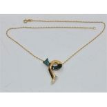 An 18ct. gold, malachite and diamond pendant necklace, suspended from 18ct. gold chain, length 41cm.