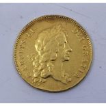 A scarce Charles II 1669 gold five guineas coin, obv.first laur. bust, rev.crowned cruciform