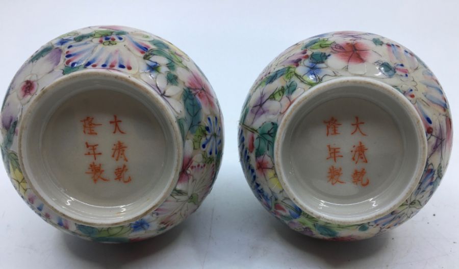 An early 20th century Chinese porcelain garniture Millefleur pattern ginger jar and cover together - Image 6 of 7