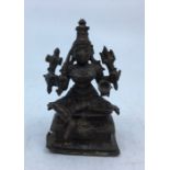 A small late 19th/early 20th century Indian bronze figure Mariamman, height 8.5cm