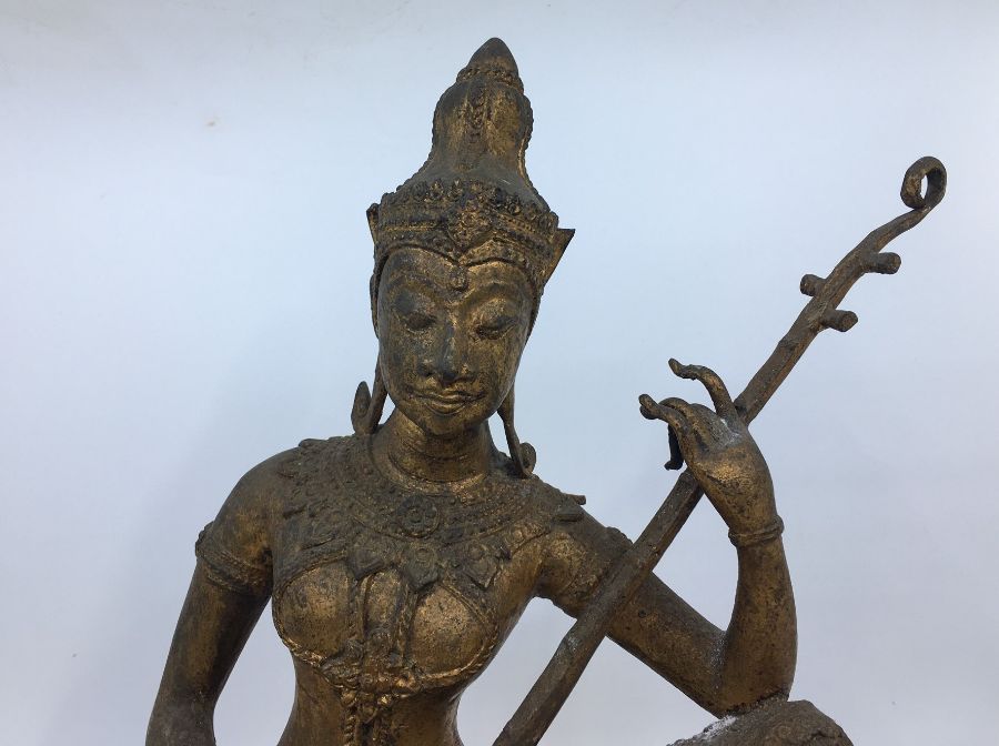 An Indian bronze figure of Saraswati seated playing the Veena, late19th/early 20th century, traces - Image 2 of 5