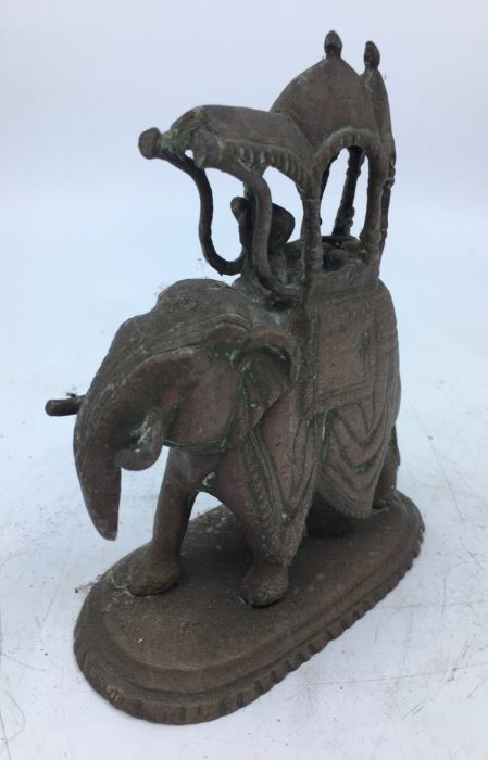 A 20th century Indian bronze figure of an elephant with rider, height 15cm. - Image 2 of 4