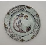 An 18th century Bristol Delftware plate, painted in colours, diameter 23cm, height 3.1cm.