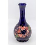 Moorcroft Anemone long neck vase. Height approx 21cm. No sign of damage.