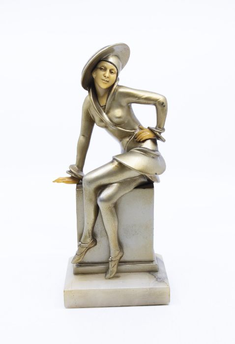 1930’s Spelter figure of a seated lady on onyx base. Height approx 25cm. Slight paint loss to the