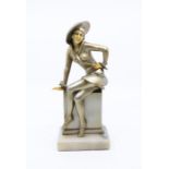1930’s Spelter figure of a seated lady on onyx base. Height approx 25cm. Slight paint loss to the