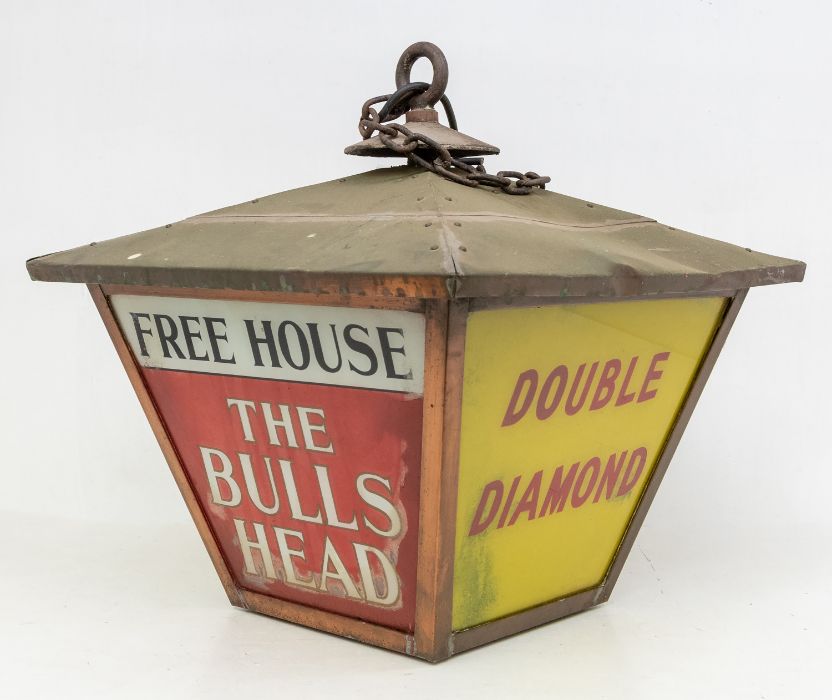 Advertising: An early to mid 20th century, outside wall hanging vintage lamp from 'The Bulls