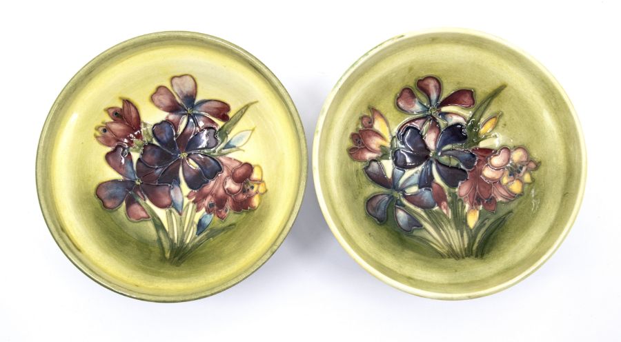 A pair of Moorcroft 'Spring Flower' small footed bowls designed by Walter Moorcroft on light green - Image 2 of 5